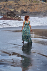 Woman walking on El Bollullo beach