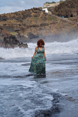 Woman walking on El Bollullo beach