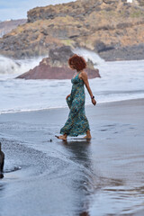 Woman walking on El Bollullo beach