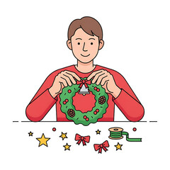 Person decorating a holiday wreath at a table.