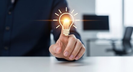 Finger touching glowing digital lightbulb icon in office setting