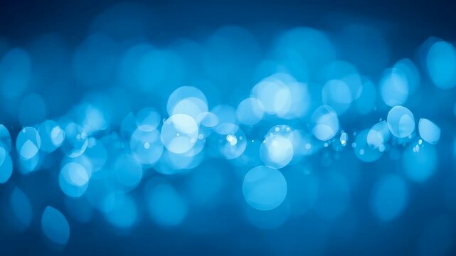 Soft blue bokeh lights creating dreamy abstract glow, gentle blur texture with luminous highlights and calm atmospheric depth