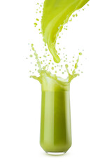 Fresh green vegetable juice pouring juice into glass with dynamic splashes, flying drops, isolated. Healthy organic drink for design of detox diet menu, fitness cuisine or restaurant, card, poster.