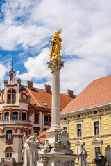 The Plague Column (Kužno znamenje), a pillar bearing an image of Virgin Mary and six saints, erected in 17th century in Glavni Trg, the main square of Maribor city center, Slovenia