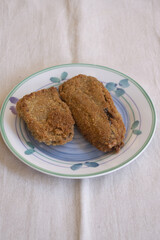 crispy homemade croquettes on rustic plate