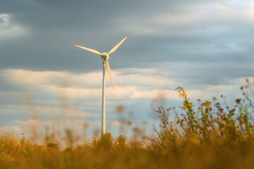 Renewable energy wind turbine with blue sky