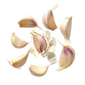 Aromatic Cloves: A close-up view presents a scattering of garlic cloves, showcasing the texture and hue of each individual segment, perfect for culinary and health-related uses.