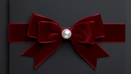 Luxury Velvet Red Bow with Pearl Center on Black Envelope | Elegant Holiday Gift Tag or Wedding Invitation Accent | Sophisticated Festive Decoration for Special Occasions

