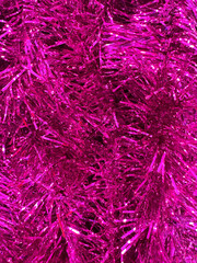 pink Christmas tinsel full frame background