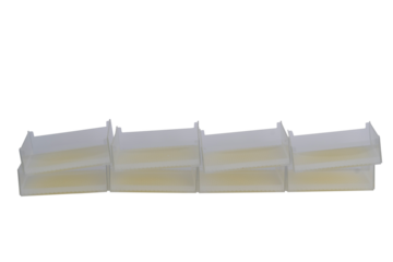 Four White Plastic Electrical Connectors Aligned Horizontally on a White Background PNG