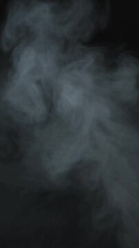 Abstract cloud of smoke or vapor against a black background. Perfect for backgrounds, design elements, overlays, or dramatic visual effects.