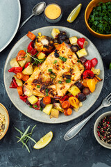 Roasted salmon fillet with vegetables.