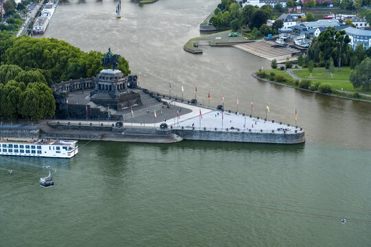 Aerial view of Deutsches Eck where the Mosel joins the Rhine, the monument of Emperor William on a sunny day, Koblenz, Rhineland-Palatinate, Germany.