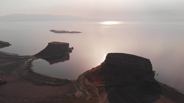 Panoramic aerial drone view of Lake Urmia Iran landscape, cliff beach at sunset