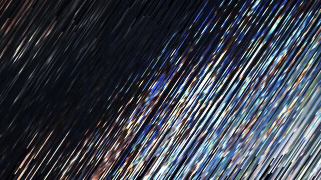 Looping seamless glitter rainbow light lines background