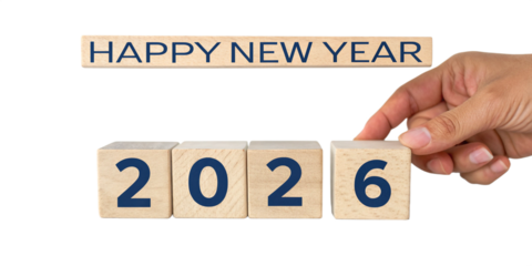 A studio shot of Happy New Year 2026 against a png white background with marble texture natural wood cube blocks arranged on a glossy surface.