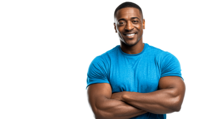 Confident Black man with muscular arms crossed smiling in a blue tshirt, ideal for fitness, health, and wellbeing promotions and concepts.