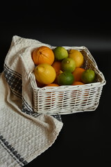 High-contrast studio shot emphasizing the bright fruit colors and the soft, rustic textile. Ideal for healthy cooking and kitchen decor themes