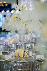 Elegant floral display, Refined candlelit wedding decoration