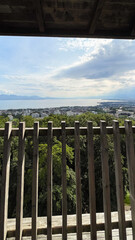 Panoramic View of a Lakeside City and Mountains