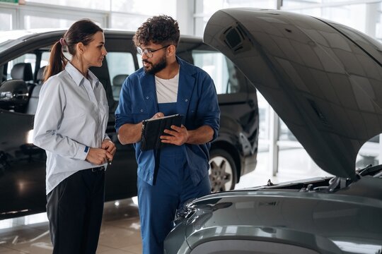 Technical inspection explained to customer indoors