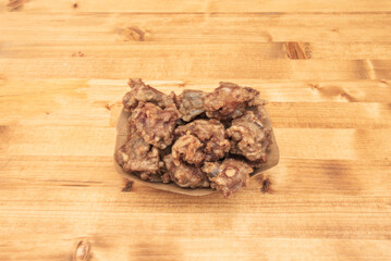 Chinese-style fried pork with sweet and sour sauce, accompanied by green and red bell peppers, pineapple chunks, and onions, served over steamed white rice