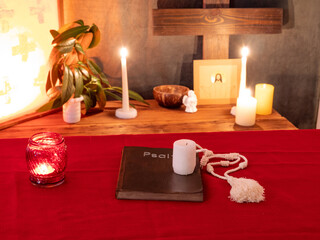 psalter, candles and rosary in monastery