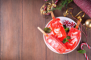 Festive Christmas holiday candy cane popsicles