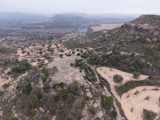Obraz premium Aerial view from a drone of the Iberian settlement of El Cascarujo in the town of Alcañiz, in the Bajo Aragón region. Province of Teruel. Autonomous Community of Aragon. Spain. Europe