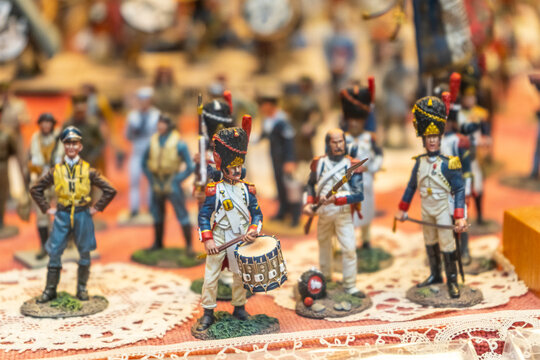 Old toy soldiers stand. Vintage tin figurine for game.