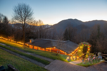 Wooden house illuminated at sunset