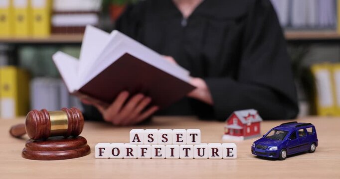 Exploring the concept of asset forfeiture in a courtroom setting with a judge and important legal elements
