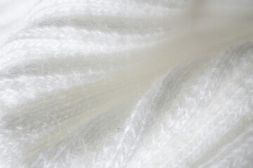 Macro Texture of Ribbed Knit Fabric. Cloud Dancer 11-4201.