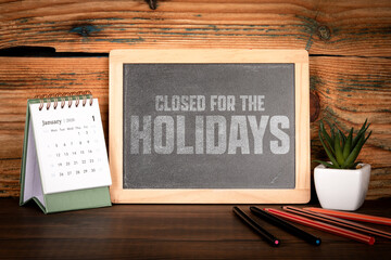 Closed For The Holidays January 2026 Notice On Chalkboard Desk Scene