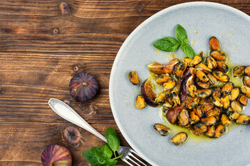 Fried seafood on a plate, mussels.