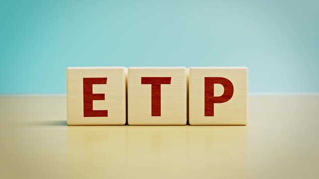 Wooden toy cubes forming the abbreviation "ETP". Exchange traded product, Stock exchange