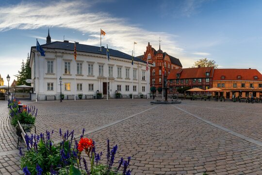 the Ystad city hall and Stortoget market square in warm evening light
