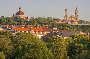 Vilnius, Lithuania. Fragment of the old city from the high point. Church of the Sacred Heart of Jesus, Church of the Ascension (Missionary Church) and other historical buildings. Photo taken in 2014.