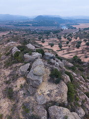 Aerial drone view of the landscape surrounding the Iberian settlement of El Cascarujo in the town of Alcañiz, in the Bajo Aragón region. Province of Teruel. Autonomous Community of Aragón. Spain