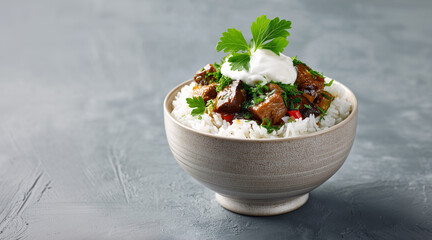 Savory Delight: A tempting bowl of fragrant rice topped with a rich medley of seasoned vegetables and a dollop of fresh cream, a culinary masterpiece.