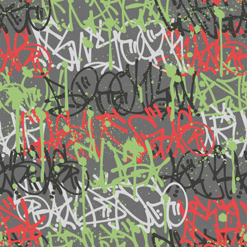 Seamless vector graffiti pattern. Abstract street tags and throw-up lettering creating an urban backdrop.