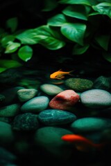 Vibrant Goldfish Swimming Amidst Colorful Stones and Greenery