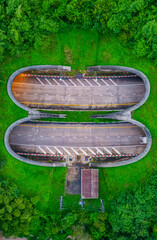 The tunnel for vehicles through the forest was built to connect the forest areas, allowing wildlife to cross back and forth.