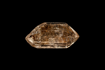 Closeup petroleum quartz (Enhydro/EnPetro Quartz)(quartz with hydrocarbon inclusions) on dark background