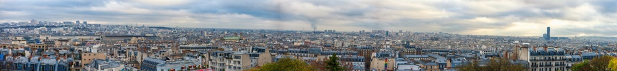 Fototapeta premium Panoramic view of Paris City from the top of the Butte Montmartre, looking down towards Square Louise Miche. France