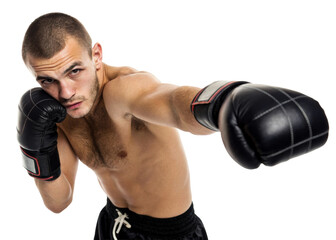 Male boxer in black gloves throwing a punch forward during a fight or training session, perfect for sports promotions and fitness content.