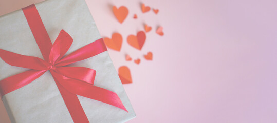 Close-up of a gas stove burner with a coin resting on it, showing blue flames.