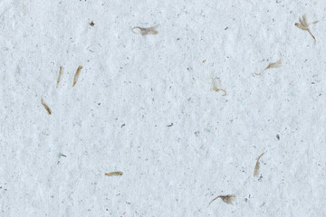 Natural paper mulberry handmade recycled texture background with plant fiber inclusions. White eco friendly art and craft concept