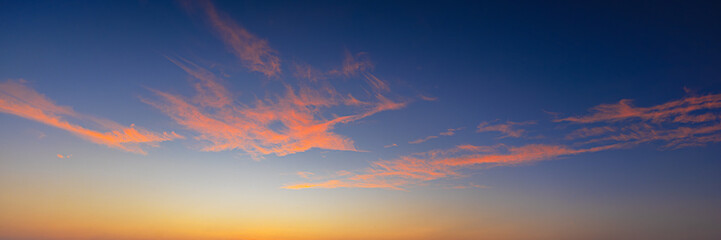 Fototapeta premium Majestic real sunrise sundown sky background with gentle colorful clouds,Celestial World concept:Sunset / sunrise with clouds