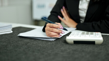 Tax deduction planning. Businesswoman calculate business balance prepare tax reduction.